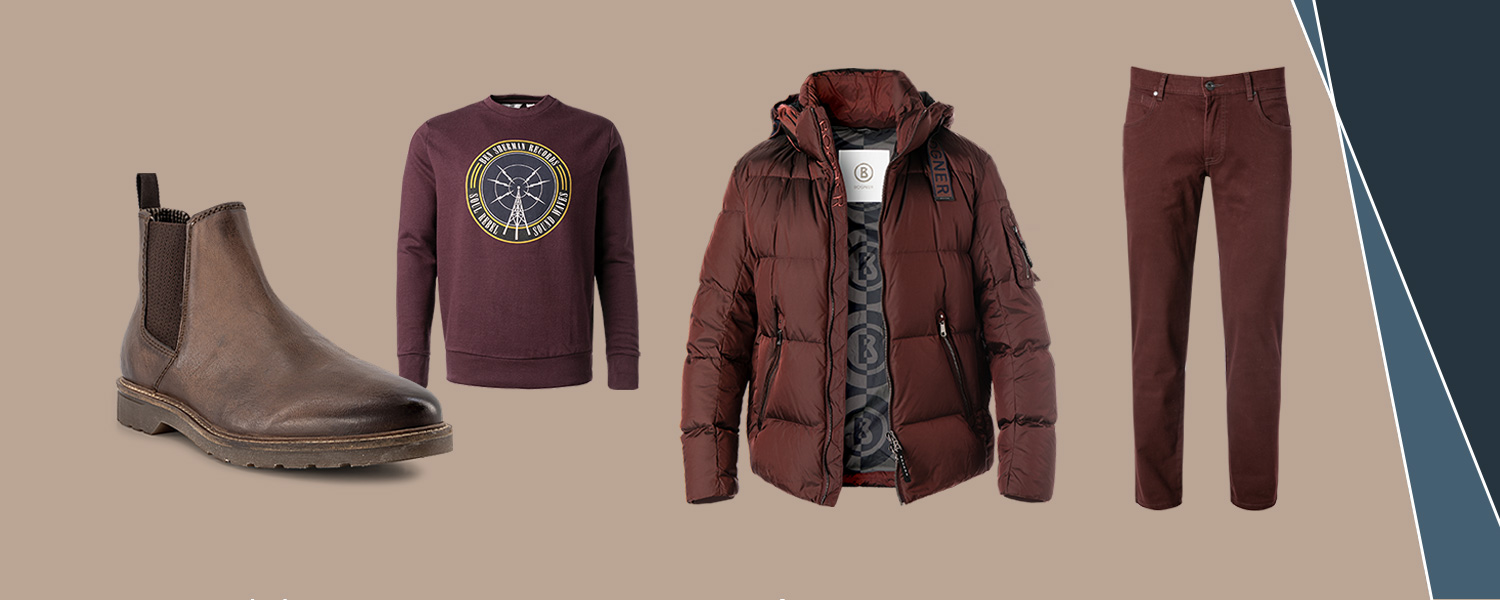 Dunkles Winter-Outfit in Rottönen: Braune Chelsea Boots, weinroter Pullover mit Print, dunkelrote Jacke von rostrote Hose.