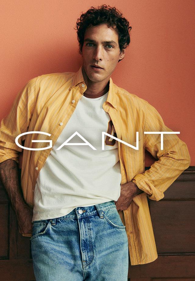 Ein Model präsentier die neue Sommer Kollektion der Marke GANT