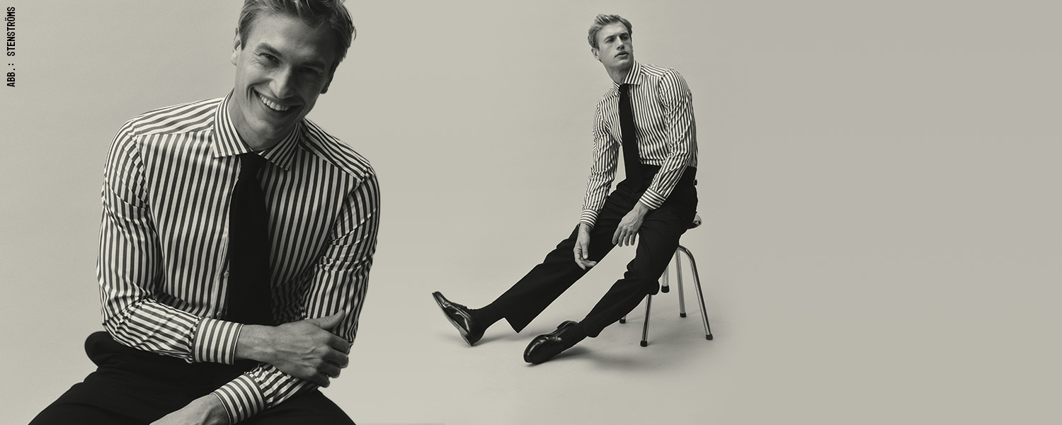 Mann im gestreiften Business-Hemd mit Krawatte, eleganter Look für Büro und Business-Casual.