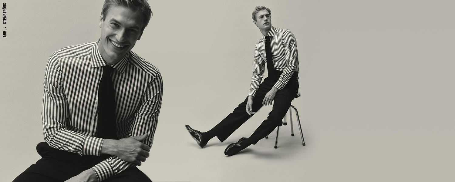 Mann im gestreiften Business-Hemd mit Krawatte, eleganter Look für Büro und Business-Casual.