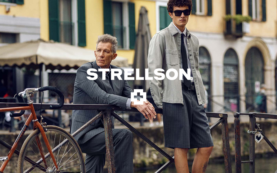Zwei Männer in STRELLSON-Looks an einem Kanal in der Stadt, mittiges STRELLSON-Logo
