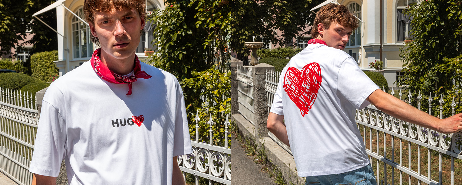 Modisches Statement-T-Shirt mit rotem Herz-Print – stylischer Streetwear-Look mit Liebe zum Detail.