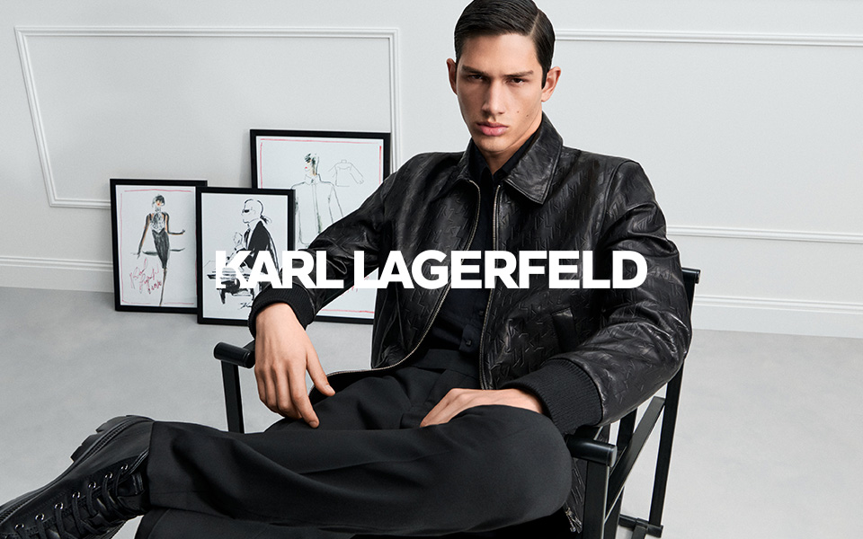 Schwarze Lederjacke mit Prägung, klassisch geschnitten, Mann im stilvollen Sitz