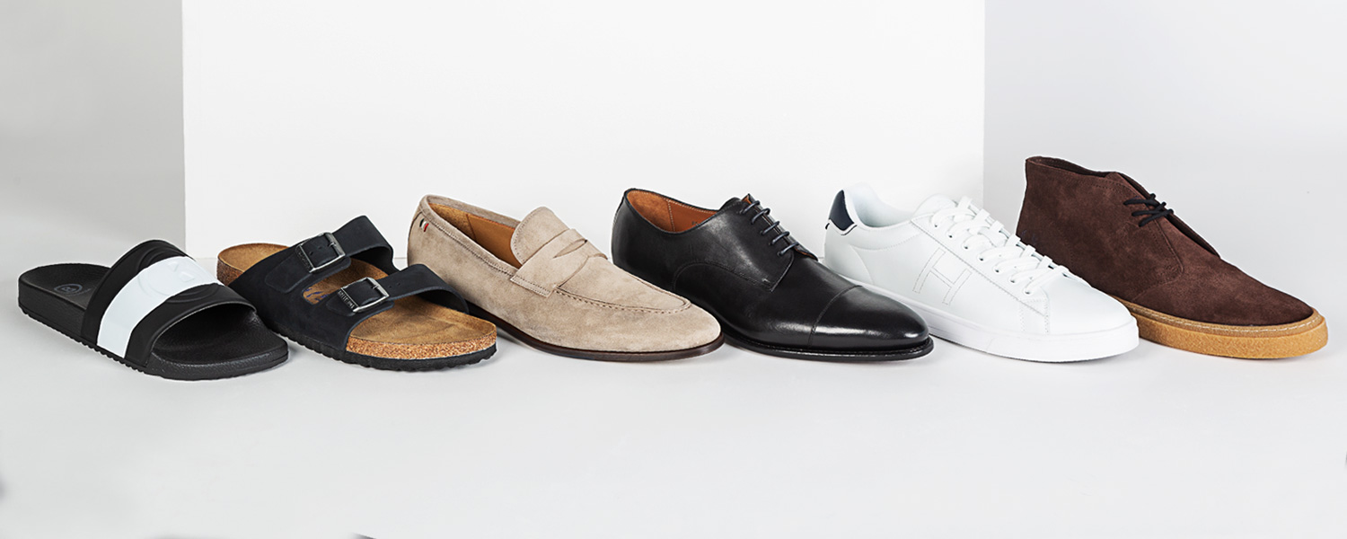 Herrenstiefeletten und Boots aus Leder und Velours in Braun, Grau und Schwarz.