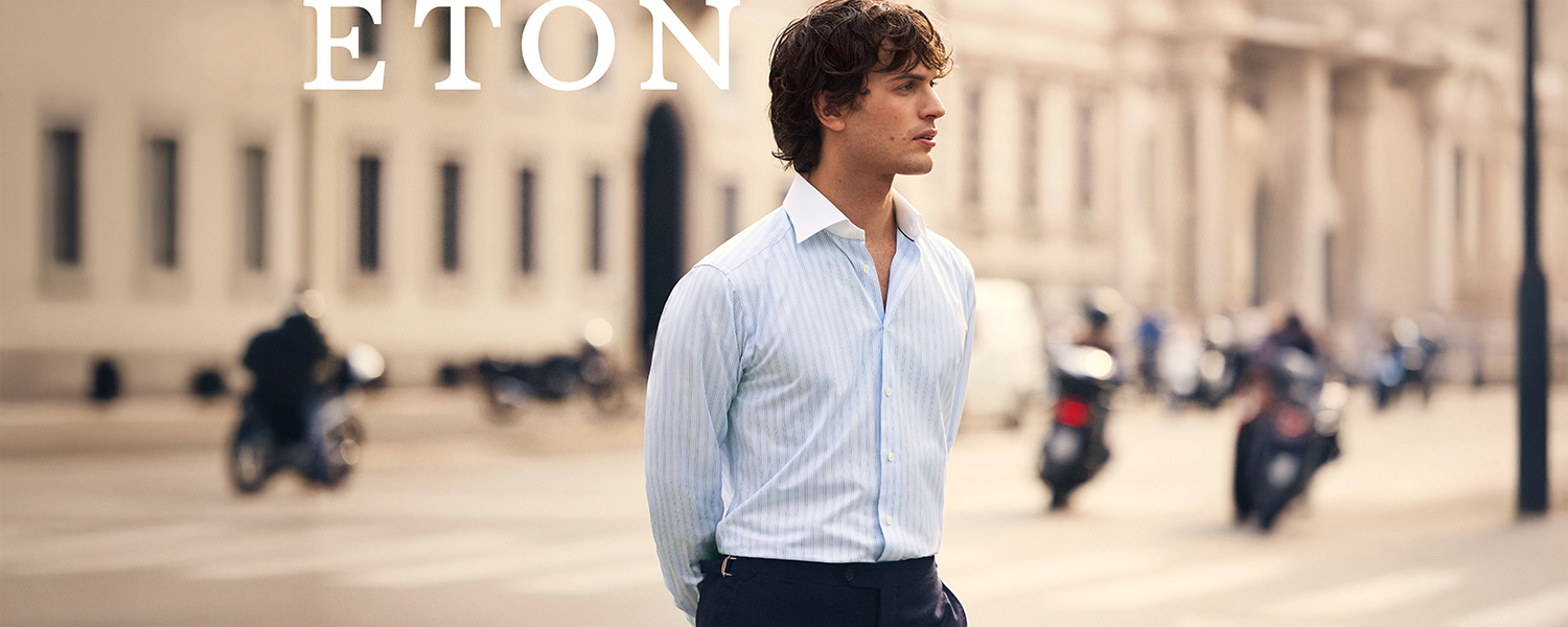 Mann in gestreiftem Business-Hemd aus Baumwolle, urbanes Umfeld