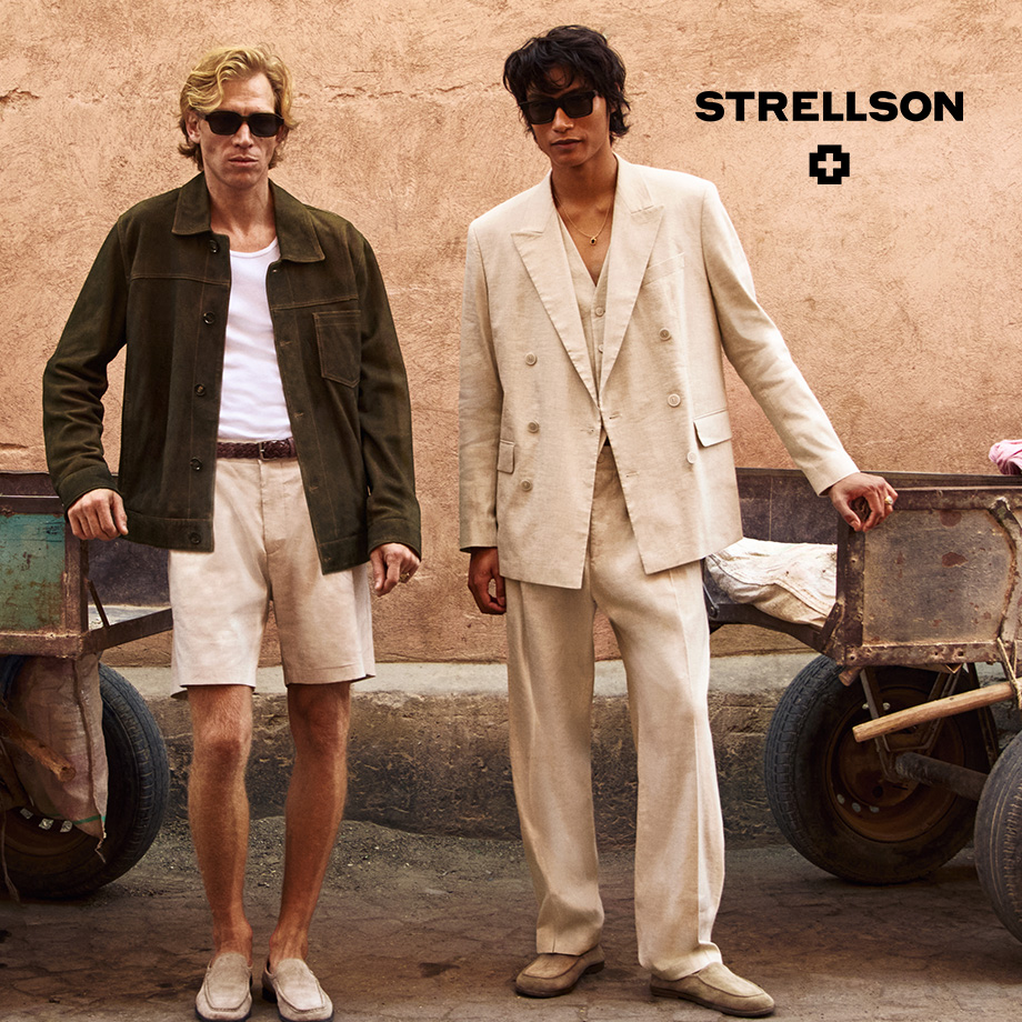 Männer in olivgrüner Jacke mit Shorts und beigefarbenem Leinenanzug mit Hemd, lässig präsentiert