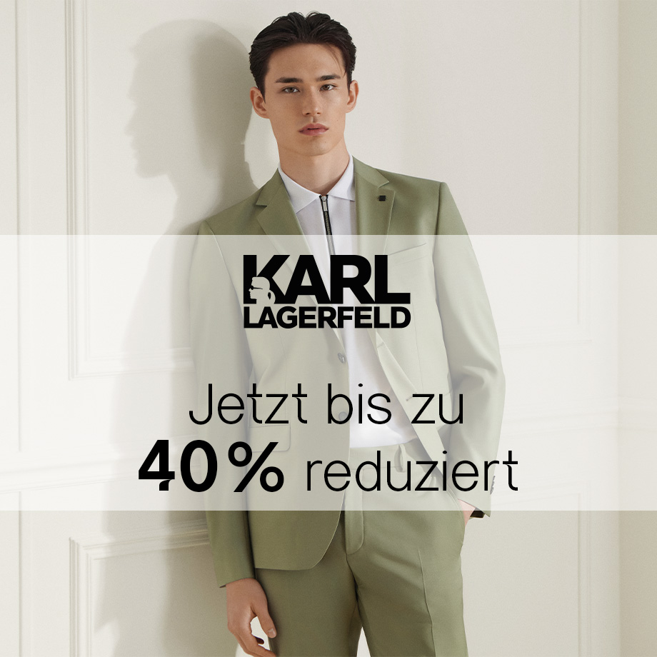 Hellgrüner Anzug, klassisch geschnitten, mit weißem Hemd, elegant präsentiert